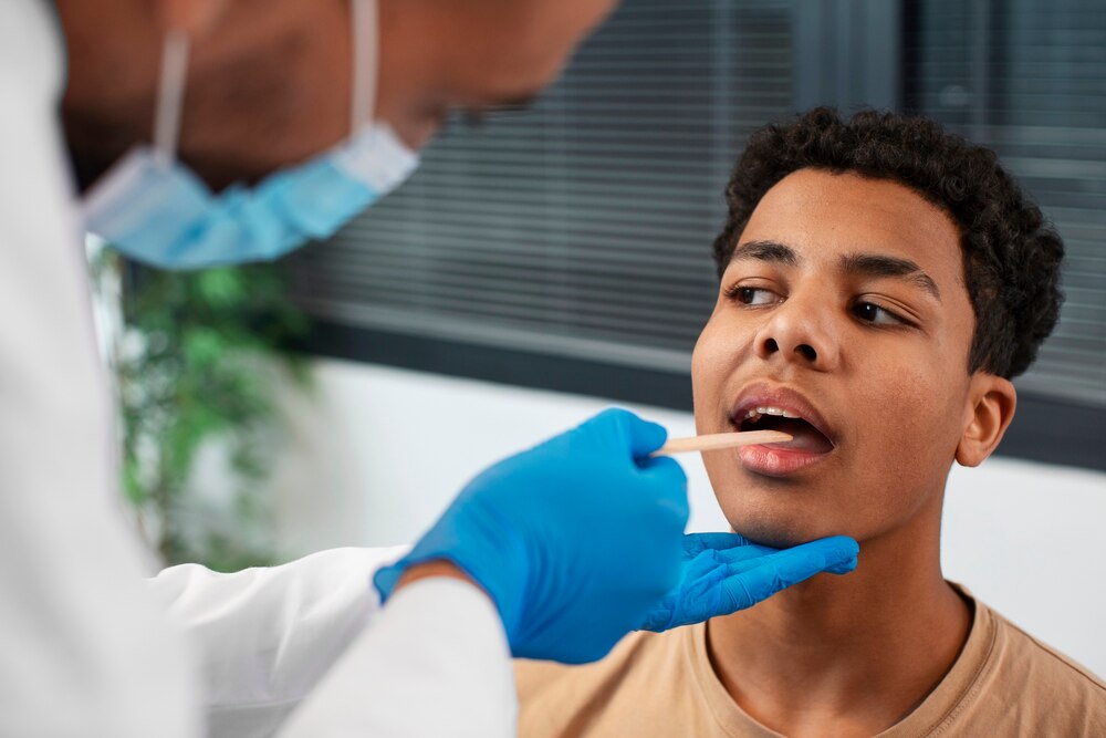 Doctor taking care of afro-american child